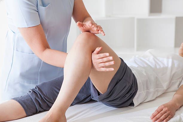 Sports Rehab manipulative teacher with a massage to customers at the salon